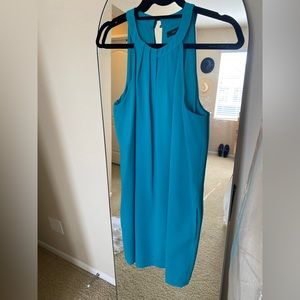 BCBG teal dress with asymmetrical key-hole neckline
